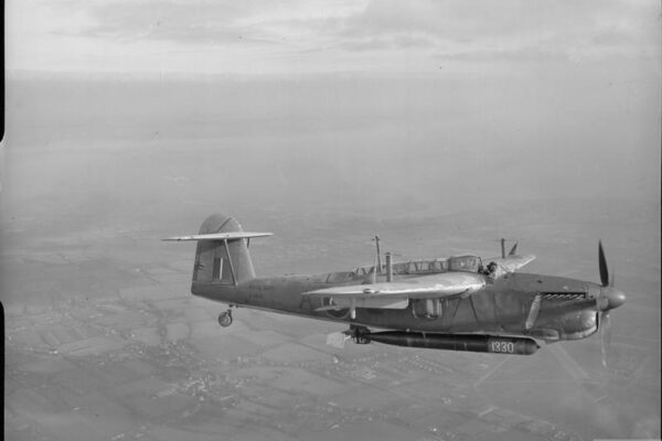 Fairey Barracuda carrying a torpedo © IWM A 20180 THE ROYAL NAVY DURING THE SECOND WORLD WAR (A 20180) A Fairey Barracuda II (P 9926) from Lee-on-Solent Fleet Air Arm Station, with torpedo, in flight. The Fairey Barracuda torpedo bomber is a combination of dive and torpedo bomber, and is the newest to come into service with the Fleet Air Arm. The wooden plane that steadied the torpedo before it struck the water and broke off can be clearly seen at the rear of the weapon. Copyright: © IWM. Original Source: http://www.iwm.org.uk/collections/item/object/205186777