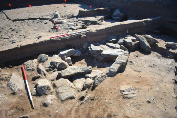Stone slab platform during excavation Stone slab platform during excavation