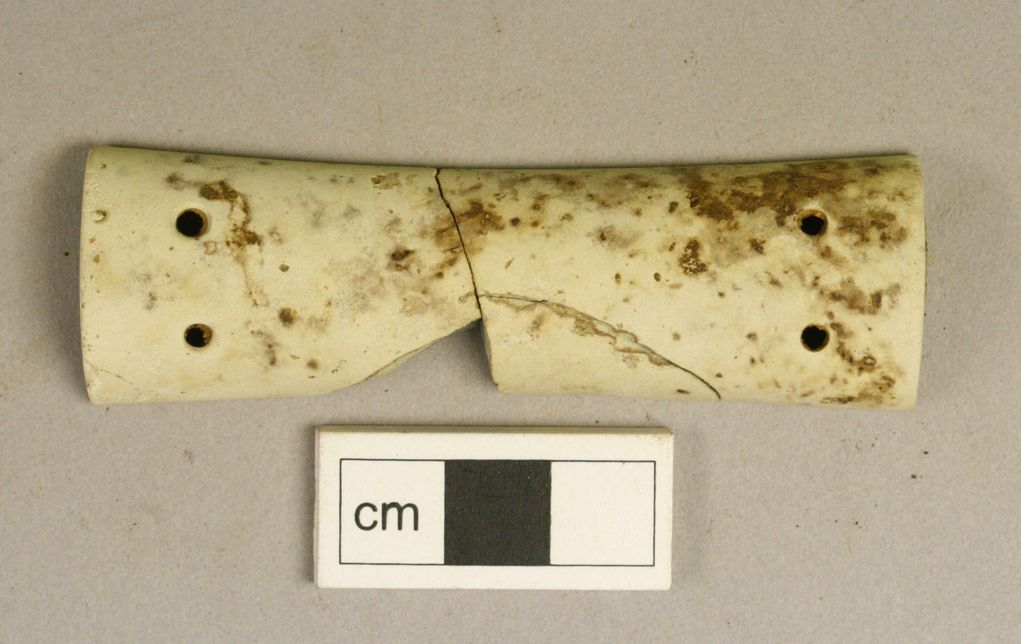 Antler wrist guard from a Bronze Age pit grave