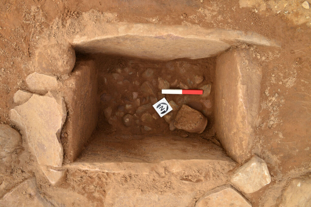Mid-excavation of a Bronze Age cist Mid-excavation of a Bronze Age cist