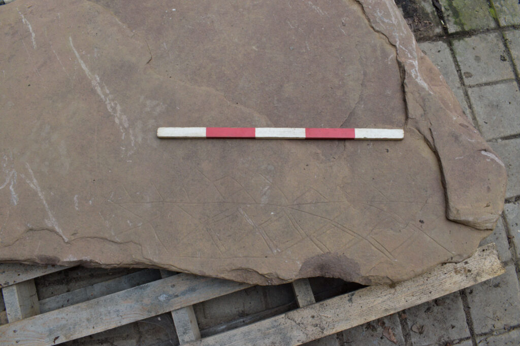 Decorated cist capstone slab Decorated cist capstone slab